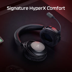 Black HyperX gaming headset on a dark surface with 'Signature HyperX Comfort' text.