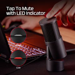 Black microphone with mute feature and LED indicator in front of a laptop.