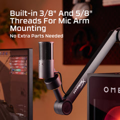 Microphone with arm and text about thread sizes for mounting, with a blurred background.